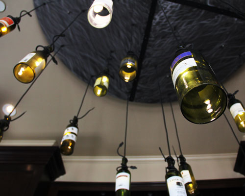 Decorative bottle lamps in Grimaldi's interior